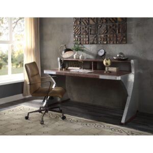 Brancaster executive writing desk with top-grain leather top and riveted aluminum sled base.