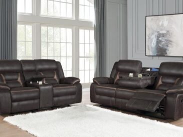 Brown reclining sofa and loveseat set with contrast stitching, USB ports, and storage console for modern living rooms.