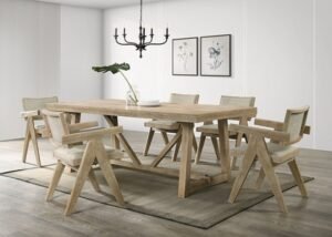 Contemporary 7-piece dining set in oak with trestle table and cushioned arm chairs for modern dining interiors.