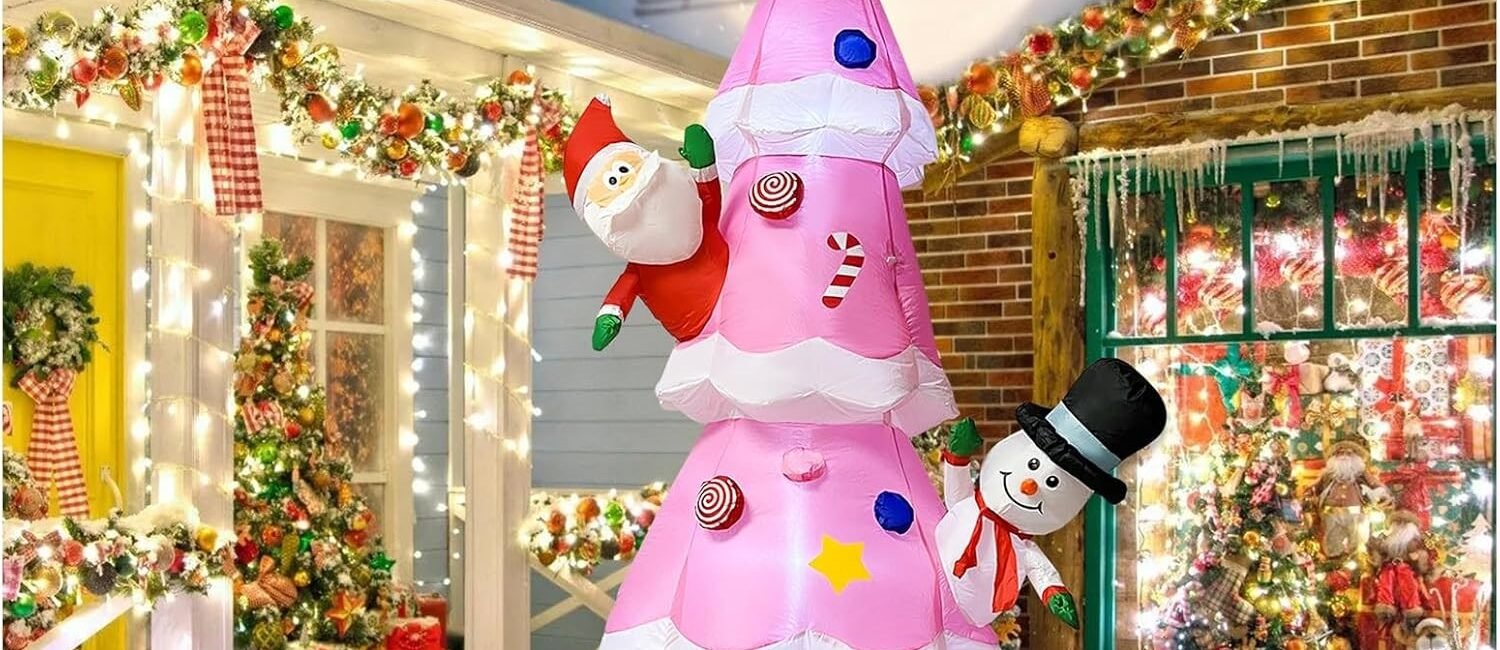 Pink inflatable Christmas tree with Santa Claus, Snowman, and gift boxes