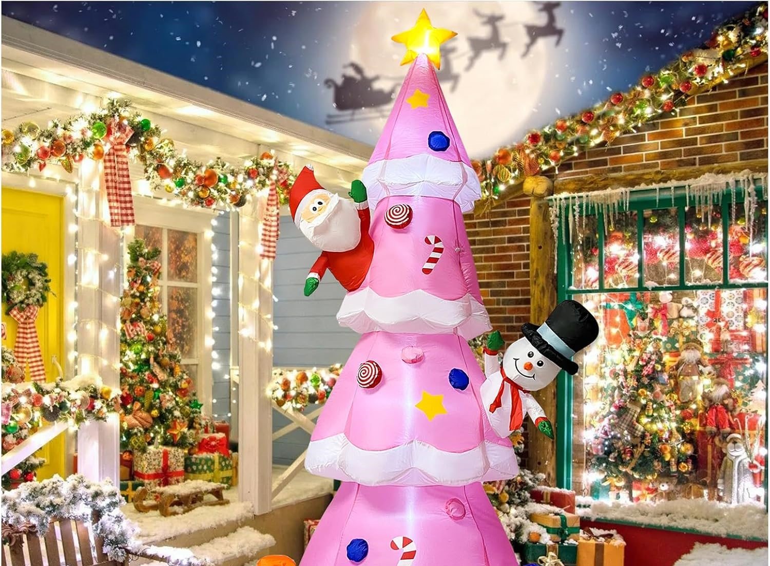Pink inflatable Christmas tree with Santa Claus, Snowman, and gift boxes