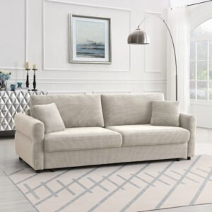 Beige modern farmhouse sofa with pull-out sleeper bed and neutral living room décor.
