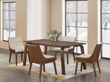 Mid-century modern walnut dining set with rectangular table and four curved-back upholstered chairs in a bright contemporary dining room.