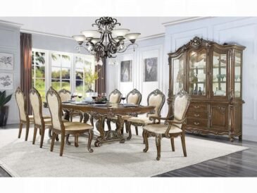 Antique oak 9-piece dining set with extendable pedestal table, carved details, and elegant traditional European décor styling.