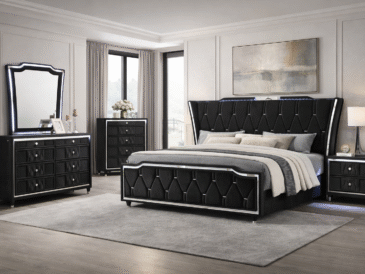 Modern black upholstered bed styled in an elegant, contemporary bedroom interior